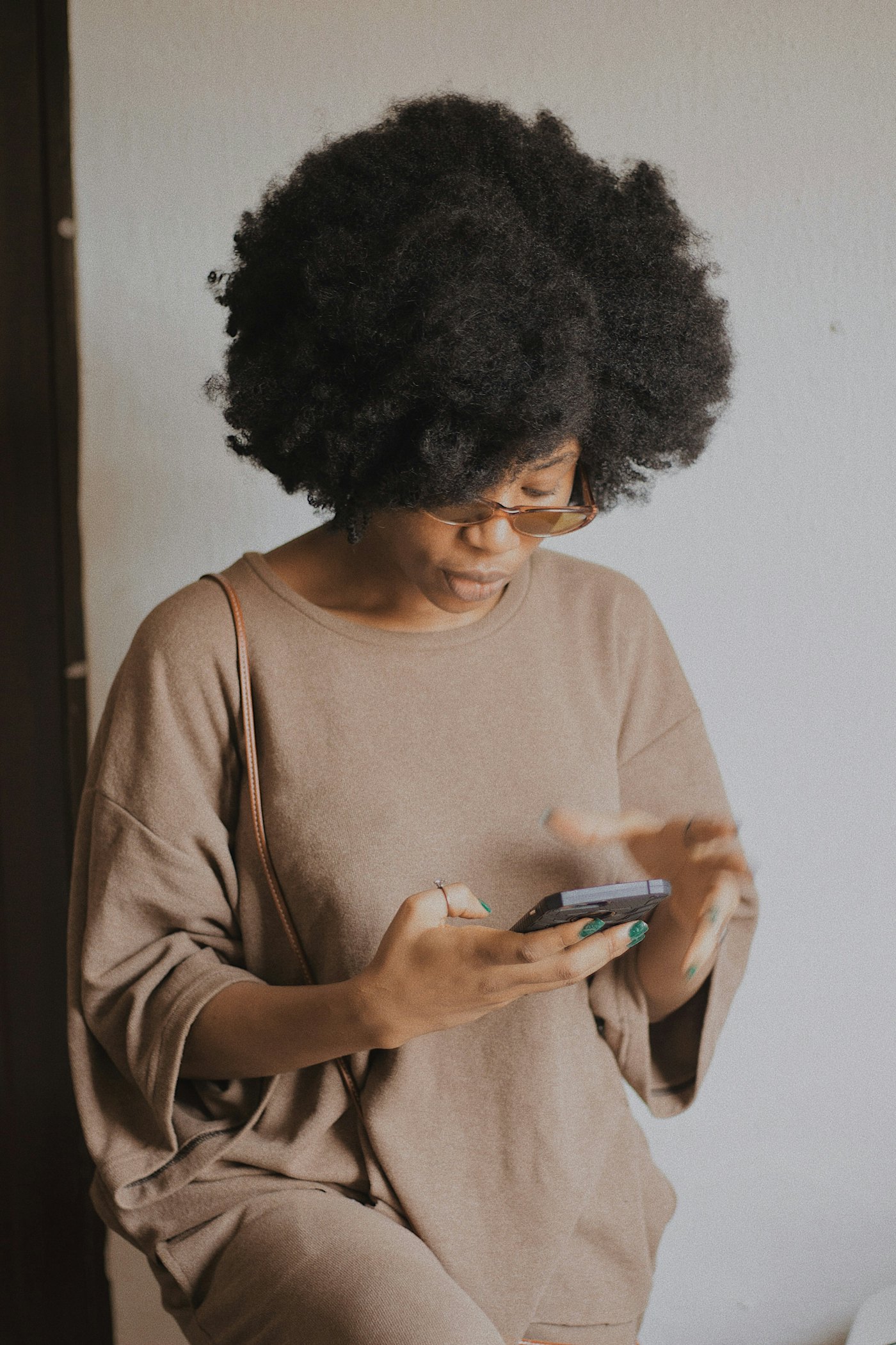 A mother looking at her phone